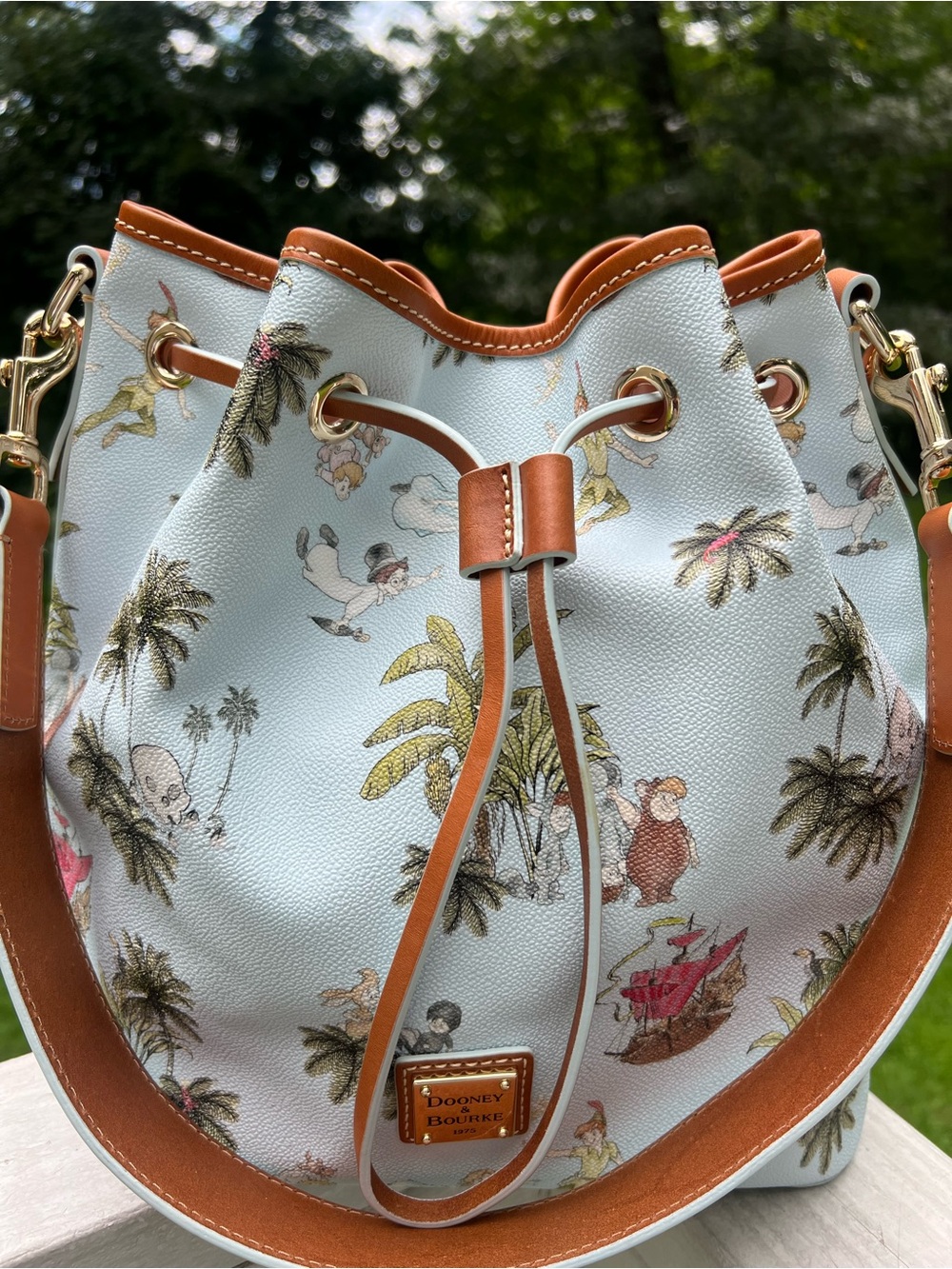 DOONEY AND BOURKE DISNEY PETER
PAN DRAWSTRING HOBO BAG